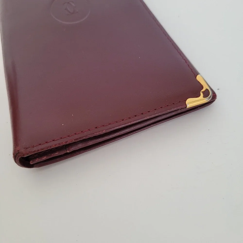 Cartier Must de Cartier Burgundy Leather Long Bifold Wallet Gold Corners Italy